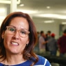 Magda Rosado, speaking on camera at a SubTo community event.